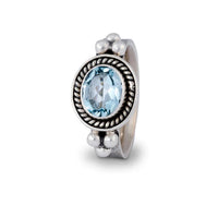 Ritual Ring SG0122 Oval Blue Topaz Sterling Ring With Side Dots Decoration Textured Band
