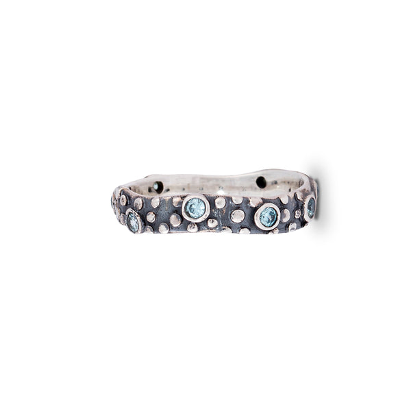 Ritual Ring SG0191 Narrow Sterling Silver Ring With Dotted Texture And Blue Zirconias